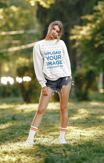 Mockup of a Serious Woman Wearing a Sweatshirt and Posing 