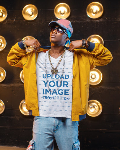 T-Shirt Mockup of a Rapper Wearing Gold Chains on a Set