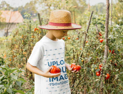 T-Shirt Mockup of a Boy Harvesting Tomatoes 35595-r-el2