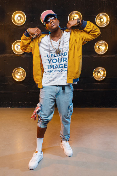 V-Neck T-Shirt Mockup of a Rapper Posing on a Set