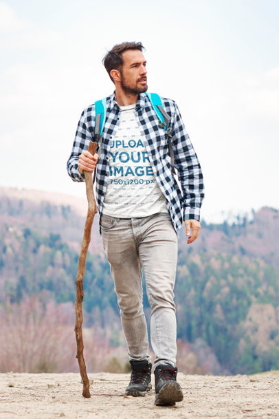 T-Shirt Mockup Featuring a Man Hiking