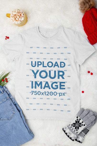 Mockup of a Flat Laid Tee Surrounded by Winter Decorations 