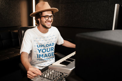 Mockup Featuring a Music Producer Wearing a T-Shirt 39724-r-el2