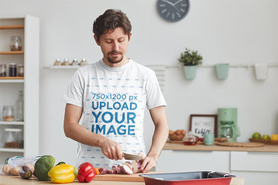 T-Shirt Mockup of a Man Cooking Veggies at Home