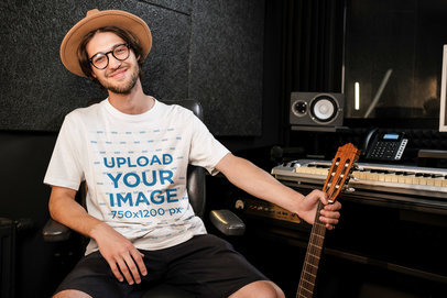 T-Shirt Mockup Featuring a Guitarist Hanging Out in a Recording Studio 39726-r-el2