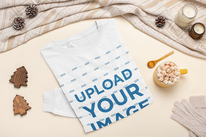 Crewneck Sweatshirt Mockup Featuring Christmas Decorations and a Hot Drink 