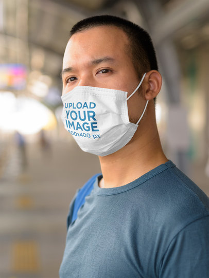 Face Mask Mockup Featuring a Serious Man 