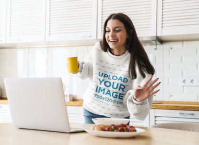 Sweatshirt Mockup of a Young Woman Taking Online Classes 