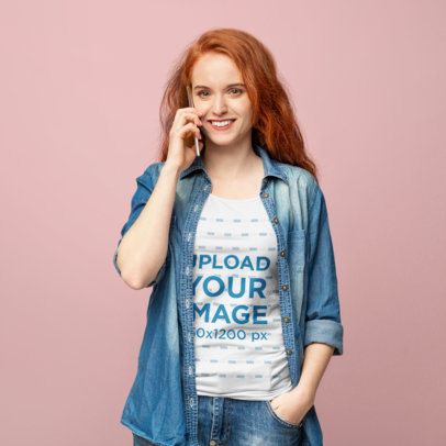 T-Shirt Mockup of a Woman at a Studio Using Her Mobile 39855-r-el2