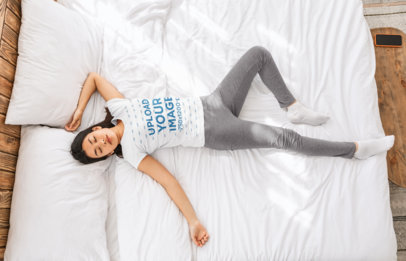 T-Shirt Mockup Featuring a Woman Sleeping