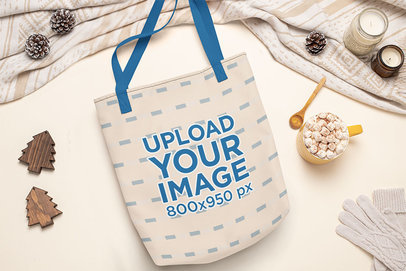 Mockup of a Flat Laid Tote Bag Featuring Xmas Pinecones m141