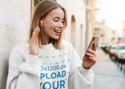 Sweatshirt Mockup Featuring a Woman Making a Video Call