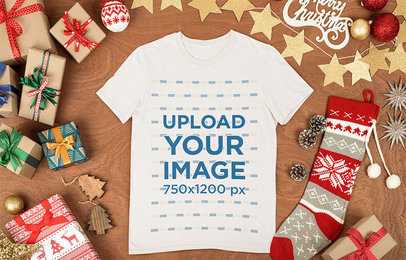 Mockup of a Flat Laid Tee Surrounded by Christmas Items