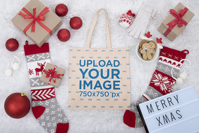 Tote Bag Mockup Featuring Christmas Decorations
