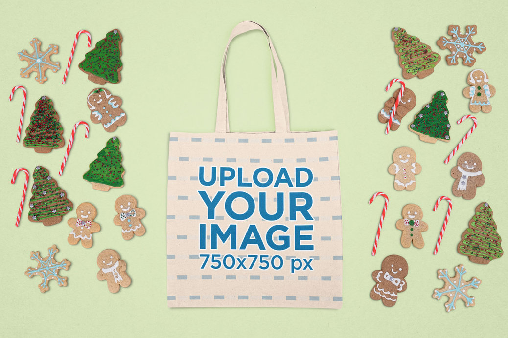 Mockup of a Flat Laid Tote Bag Surrounded by Winter Decorations