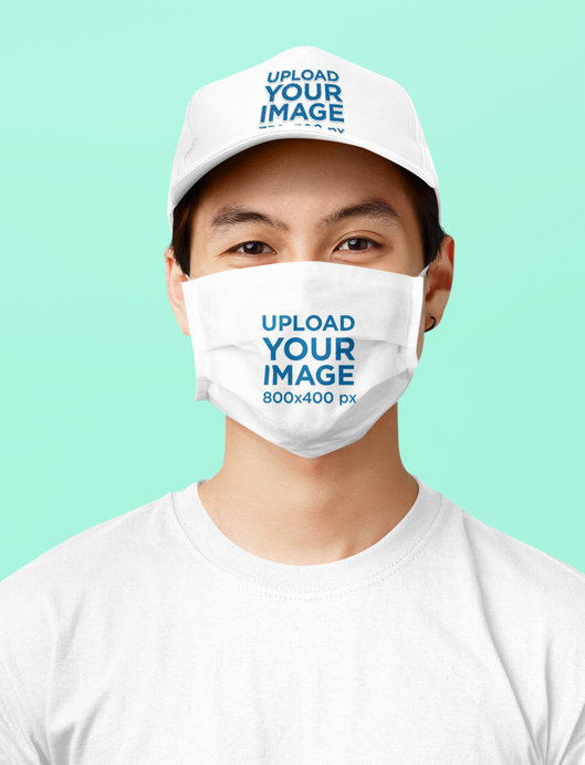 Dad Hat and Face Mask Mockup of a Smiling Man in a Studio
