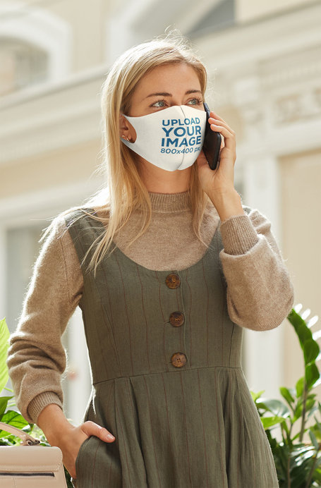 Face Mask Mockup Featuring a Long-Haired Woman on the Phone 