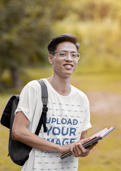 T-Shirt Mockup of a Student in a Campus with Nature 42277-r-el2