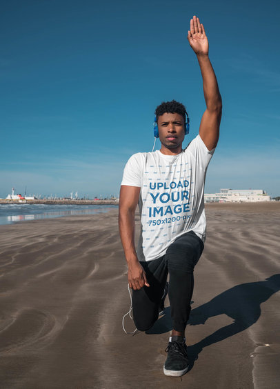 T-Shirt Mockup of a Young Man Training by the Beach 39933-r-el2