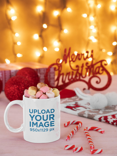 Mockup of an 11 oz Mug Filled with Marshmallows in a Christmas Setting