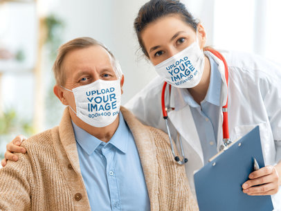 Face Mask Mockup Featuring a Female Doctor with Her Elderly Patient 