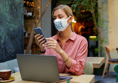Face Mask Mockup of a Woman Working in a Public Space 44274-r-el2