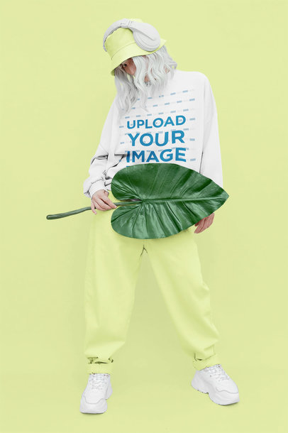 Mockup of a Woman Wearing a Sweatshirt in a Monochromatic Setting
