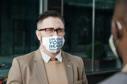 Mockup of a Serious Businessman Wearing a Sublimated Face Mask 