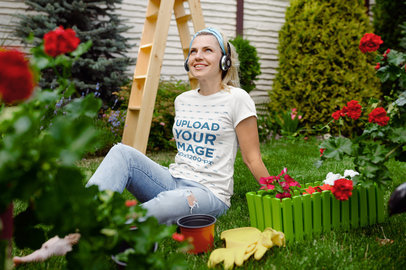 T-Shirt Mockup Featuring a Woman Resting in Her Garden