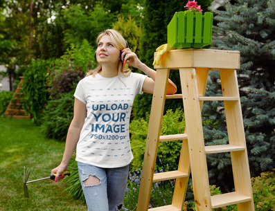 T-Shirt Mockup of a Woman Listening to Music While Doing Some Gardening 