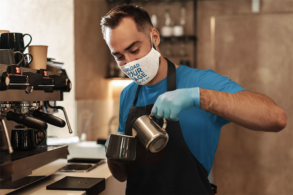 Heathered Face Mask Mockup Featuring a Barista Preparing a Hot Drink