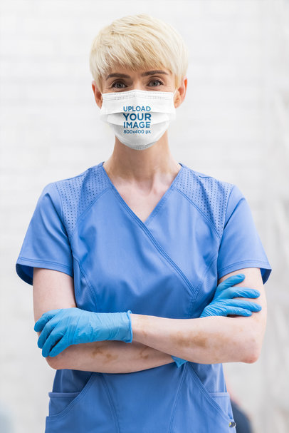 Face Mask Mockup Featuring a Female Doctor in a Blue Scrub 44055-r-el2