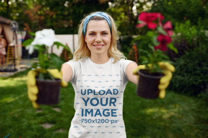 T-Shirt Mockup Featuring a Female Gardener Holding Two Flower Pots 