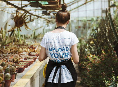 Back-View T-Shirt Mockup of a Woman at a Plant Nursery 44077-r-el2