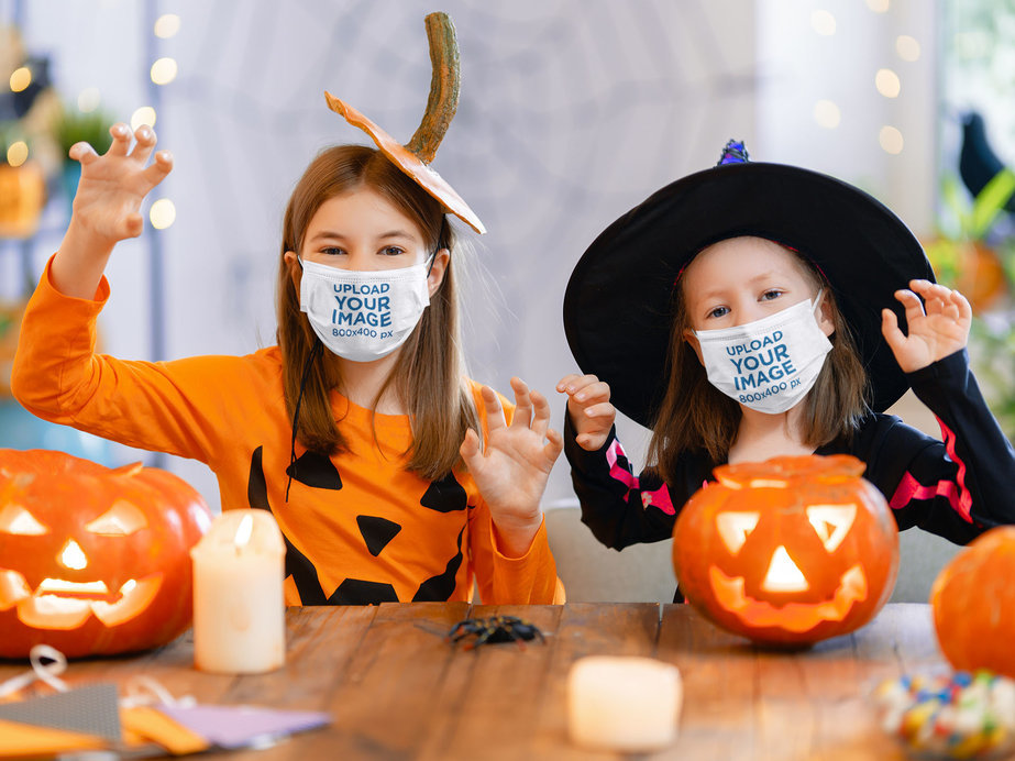 Face Mask Mockup Featuring Two Little Girls with Halloween Costumes 