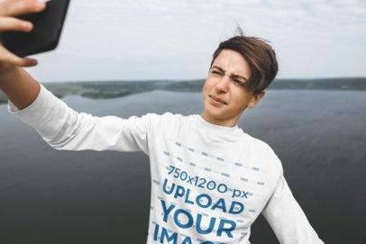Mockup of a Teenager with a Long-Sleeve Tee Taking a Selfie at a Lake 43686-r-el2