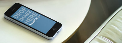 Mockup of an iPhone 5C on a Home Portrait