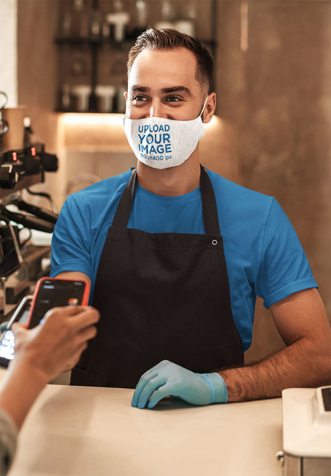 Mockup of a Happy Barista Wearing a Heathered Face Mask 