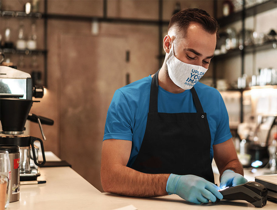 Face Mask Mockup Featuring a Waiter Using a Payment Terminal
