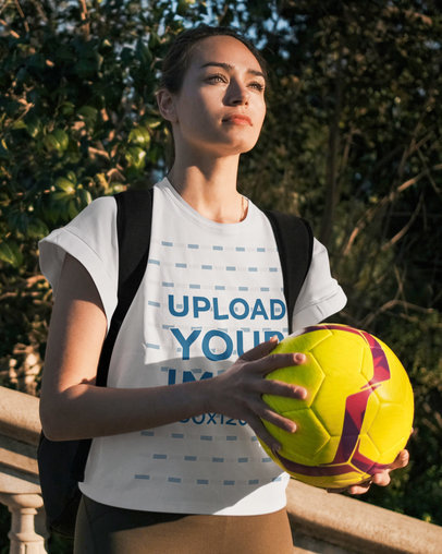 T-Shirt Mockup Featuring a Female Soccer Player