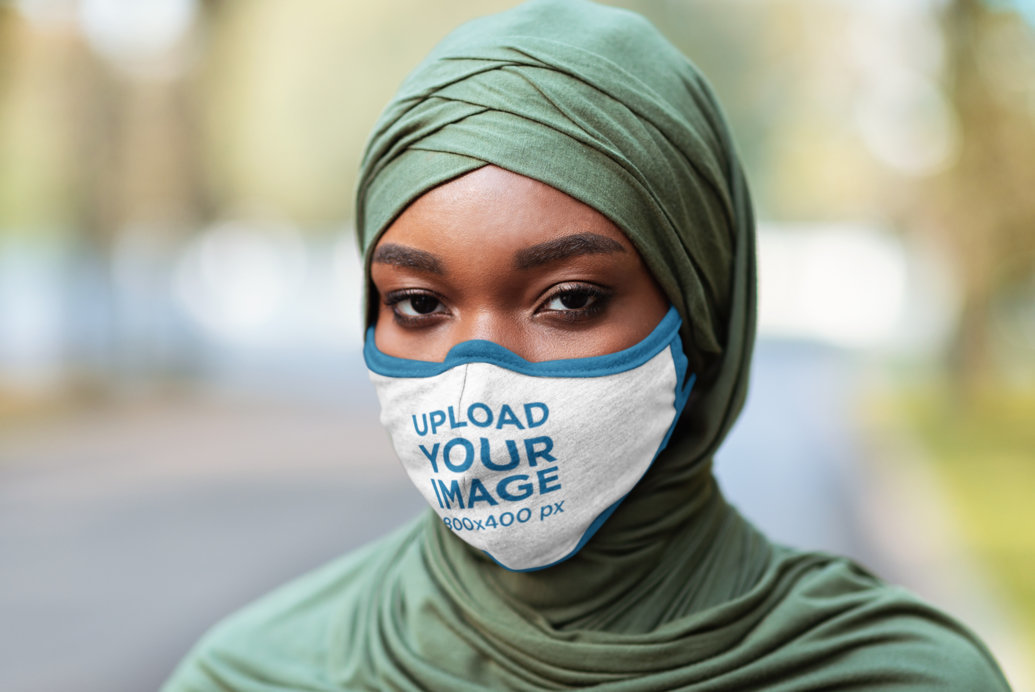 Mockup of a Woman Covering Her Mouth and Nose with a Face Mask
