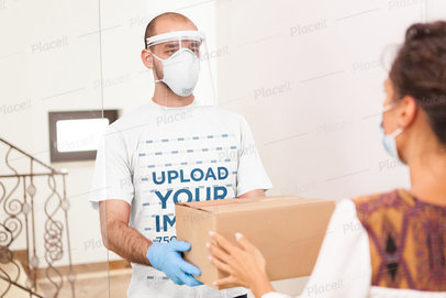 T-Shirt Mockup Featuring a Delivery Man Handling a Box 43016-r-el2