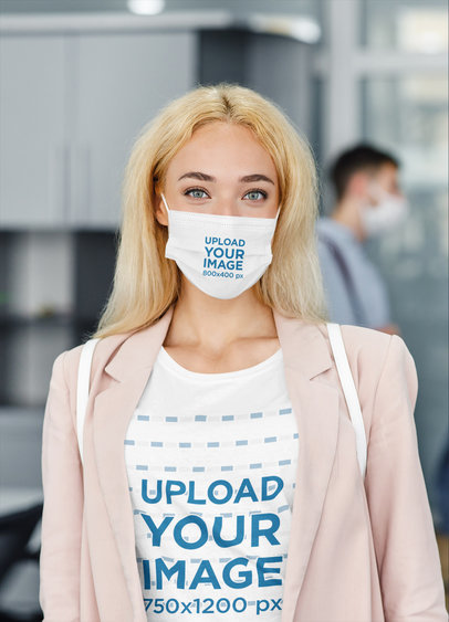 T-Shirt Mockup Featuring a Businesswoman Wearing a Sublimated Face Mask 
