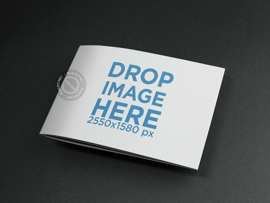 Closed Booklet on a Black Surface Mockup