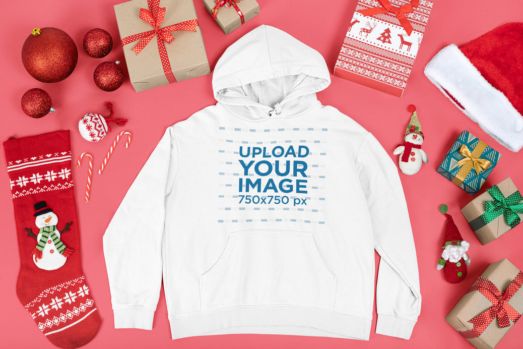 Hoodie Mockup Featuring Christmas Decorations and Presents 
