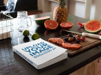 Book Lying on a Kitchen Table Next to Fruits and Knife Mockup