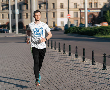 Sublimated T-Shirt Mockup of a Man Jogging on the Street