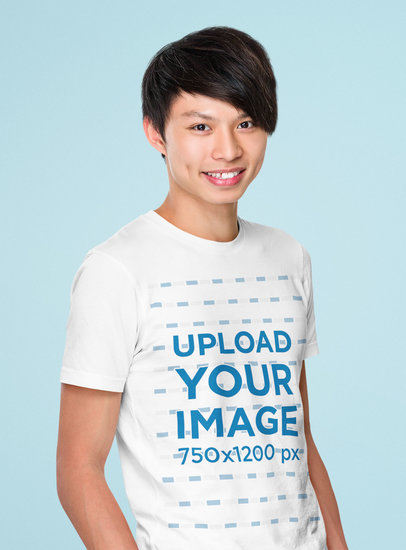Mockup of a Happy Young Man Wearing a T-Shirt and Posing Against a Colored Backdrop 44582-r-el2