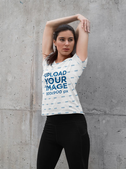 Sublimated T-Shirt Mockup Featuring a Woman Warming Up