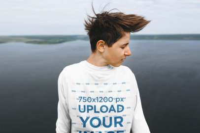 Mockup of a Teenager with a Long-Sleeve Tee Standing by a Lake 44015-r-el2